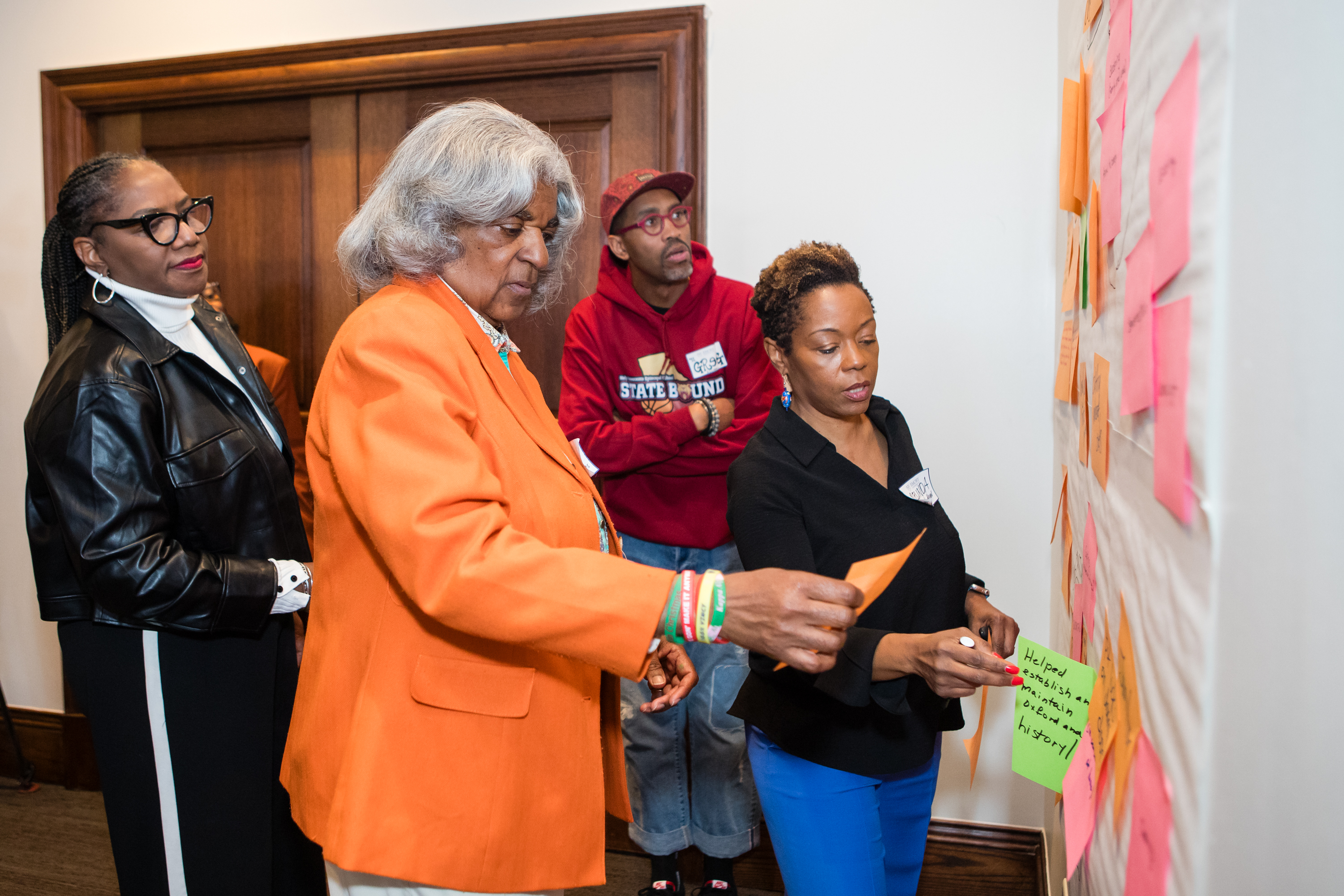 Attendees gather for the Twin Memorials Story Summit